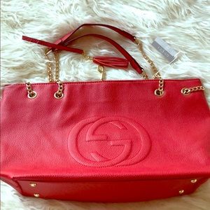 Red faux leather bag